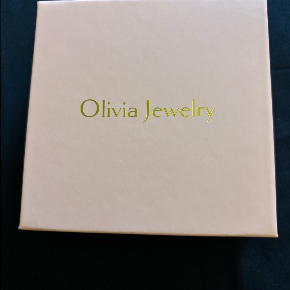 Gold and Black meaningful bracelet.